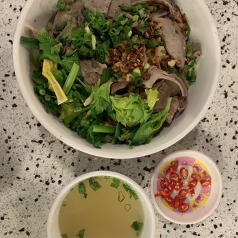 Noodle World Restaurant - a bowl of noodle and a bowl of soup - Vietnamese Near Me - Calgary, Alberta Noodle World Restaurant - a bowl of noodle and a bowl of soup - Vietnamese Near Me - Calgary, Alberta