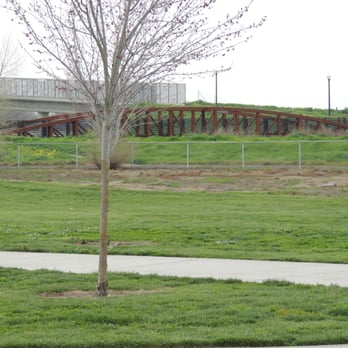 Peregrine Park - bridge on backside of park, has a path to go over water canal, and can walk downside the canal too. - Playgrounds Near Me - Sacramento, California Peregrine Park - bridge on backside of park, has a path to go over water canal, and can walk downside the canal too. - Playgrounds Near Me - Sacramento, California