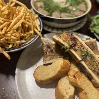 All About Pho - Bone marrow with buttery baguette slices , meatball pho, fish sauce fries - Vietnamese Near Me - Cerritos, California All About Pho - Bone marrow with buttery baguette slices , meatball pho, fish sauce fries - Vietnamese Near Me - Cerritos, California