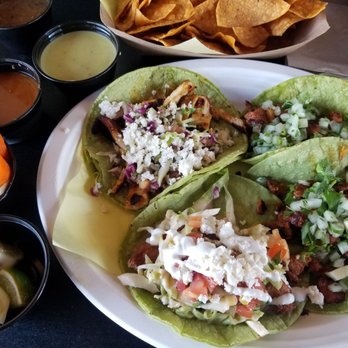 Taco Mesa - From top left clockwise: blackened chicken, al pastor, al pastor, battered fish - Mexican Near Me - Costa Mesa, California Taco Mesa - From top left clockwise: blackened chicken, al pastor, al pastor, battered fish - Mexican Near Me - Costa Mesa, California