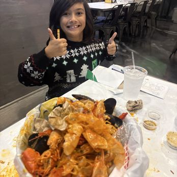 Crab N Spice - One happy kid - Seafood Near Me - Corona, California Crab N Spice - One happy kid - Seafood Near Me - Corona, California