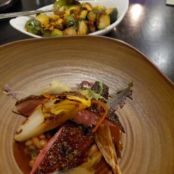Spoon and Stable - DRY AGED DUCK BREAST with flageolet bean, parsnip sofrito, endive, tangerine confit, mizuna (near)
BRUSSELS SPROUTS (far) - New American Near Me - Minneapolis, Minnesota Spoon and Stable - DRY AGED DUCK BREAST with flageolet bean, parsnip sofrito, endive, tangerine confit, mizuna (near)
BRUSSELS SPROUTS (far) - New American Near Me - Minneapolis, Minnesota