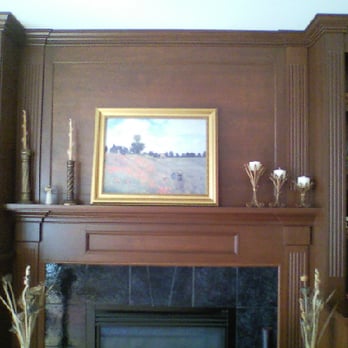 Wood Transformations - a picture of a fireplace in a living room - General Contractors Near Me - Rochester, New York Wood Transformations - a picture of a fireplace in a living room - General Contractors Near Me - Rochester, New York