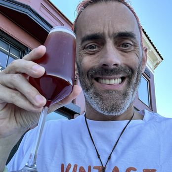 Suzette - Moi holding à Kir Breton - Cafes Near Me - Sausalito, California Suzette - Moi holding à Kir Breton - Cafes Near Me - Sausalito, California