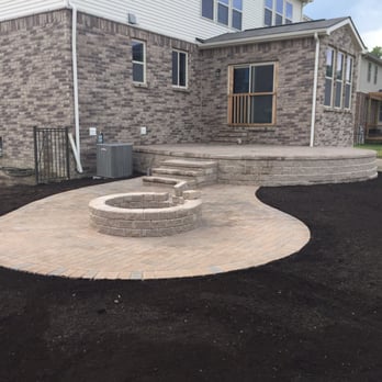 Todaro's Landscaping - a patio with a fire pit - General Contractors Near Me - Chesterfield, Michigan Todaro's Landscaping - a patio with a fire pit - General Contractors Near Me - Chesterfield, Michigan