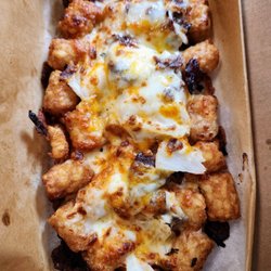 Domino's Pizza - Philly Cheesesteak Loaded Tots with no green peppers.  It has a very satisfying balance between tots and toppings.