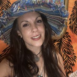 Come on in to Instant Karma in downtown Asheville, NC; your one-stop hippie shop. While you're there, get a palm or tarot reading with me!