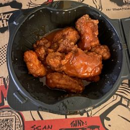 a bowl of chicken wings