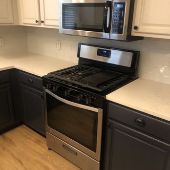 Wallace Granite - Quartz counters and glass subway tile backsplash install - Countertop Installation Near Me