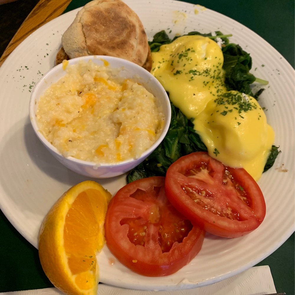The Frog Pond - Eggs Florentine Benedict with cheesy grits - Breakfast & Brunch Near Me - St Pete Beach, Florida The Frog Pond - Eggs Florentine Benedict with cheesy grits - Breakfast & Brunch Near Me - St Pete Beach, Florida