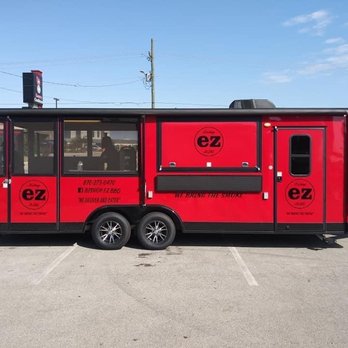 Bishop EZ BBQ - a red food truck parked in a parking lot - Food Trucks Near Me - Jonesboro, Arkansas Bishop EZ BBQ - a red food truck parked in a parking lot - Food Trucks Near Me - Jonesboro, Arkansas
