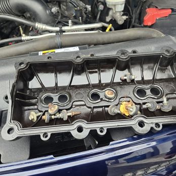Fogg Motors - Cracked valve cover on the left side that leaked oil on the spark plugs for so long it cause permanent damage. - Car Dealers Near Me - Battle Creek, Michigan Fogg Motors - Cracked valve cover on the left side that leaked oil on the spark plugs for so long it cause permanent damage. - Car Dealers Near Me - Battle Creek, Michigan