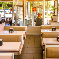 Palumbo Restaurant & Pizza - Our dining room by the entrance -- cozy booths, sunny windows, and our fall decorations. Come see the fresh new look at Palumbo's in Holmdel