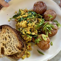 SIDE TOFU SCRAMBLE with potatoes and toast.
