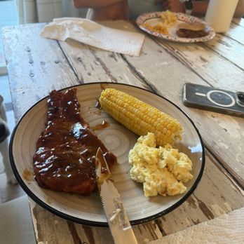 Monty's Catering - Pork steak (this is only 2/3 of it) w corn & potato salad $12 - Barbeque Near Me - Troy, Missouri