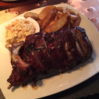 The Copper Still - Full Rack of House Smoked Ribs (2 layers) with tasty Cole slaw and good French fries. - Bars Near Me - Pomona, New York The Copper Still - Full Rack of House Smoked Ribs (2 layers) with tasty Cole slaw and good French fries. - Bars Near Me - Pomona, New York