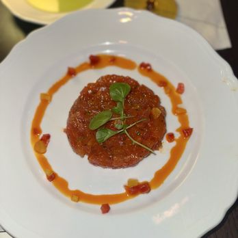 Caramá - Tuna Tartare  Big Eye Tuna, Calabrian Chili Oil, Sweet Peppers, N'duja Breadcrumbs (GF option available) (9/10) - Italian Near Me - Las Vegas, Nevada