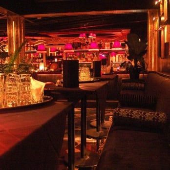 The Kennedy - a dimly lit bar with tables and chairs - Dance Clubs Near Me - Tampa, Florida