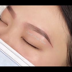 Micro-shading eyebrow tattoo.
