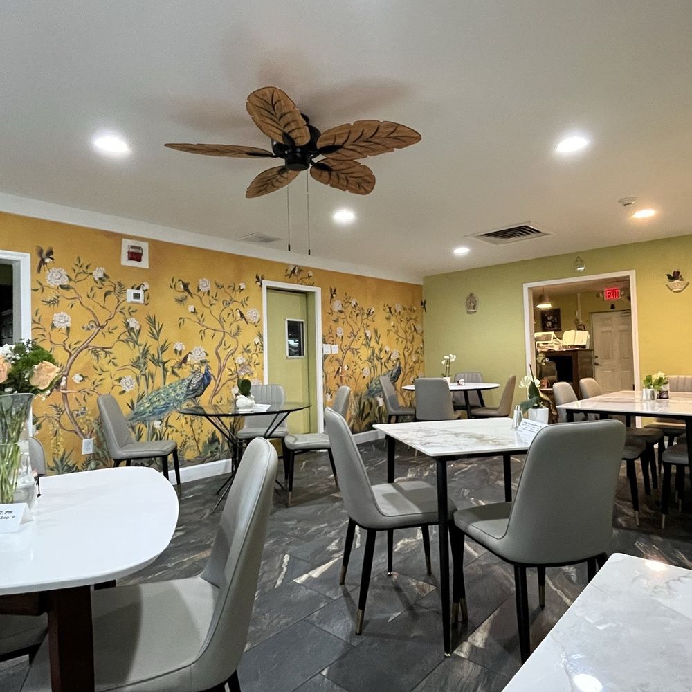 Voo La Voo Cafe - Indoor dining room - French Near Me - New Smyrna Beach, Florida Voo La Voo Cafe - Indoor dining room - French Near Me - New Smyrna Beach, Florida