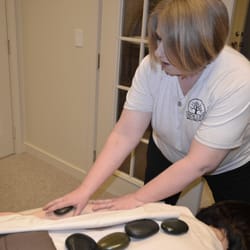 New Life Massage & Whole Living Solutions - Hot Stone Massage