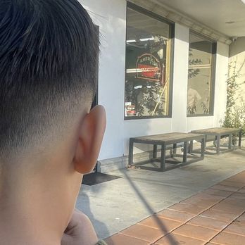 American Barbershop - Mid fade , trim on top . Done by Edward - Barbers Near Me - Orange, California