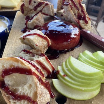 The Cellar Upstairs - Port Raspberry Baked Brie. Not a huge brie fan, but will definitely make an exception here! Delicious. - Wine Bars Near Me - St. Augustine, Florida