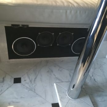 Soundsational Car Audio - Custom under the dinette leather faced speaker box plus new head unit and custom box made to JL Audio specs under the couch. - Car Stereo Installation Near Me - Eugene, Oregon