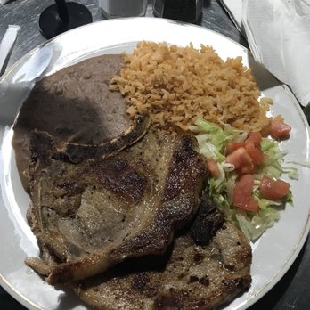 Drop Zone Cafe & Bar - Pork chops, rice and beans with 5 tortillas. A lunch special, pretty good and good amount of food. I'd order again. - Mexican Near Me - San Antonio, Texas Drop Zone Cafe & Bar - Pork chops, rice and beans with 5 tortillas. A lunch special, pretty good and good amount of food. I'd order again. - Mexican Near Me - San Antonio, Texas