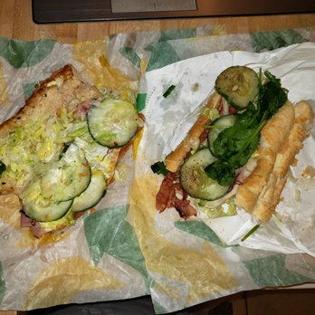 Subway - two sandwiches on wax paper on a table - Sandwiches Near Me - Kalamazoo, Michigan