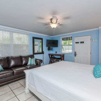 Parrot Beach Cottages - Suite 1 - Very small studio suite (bedroom/living room combo), King size bed. Sleeps 2. Entire suite is ~315 sq ft. - Vacation Rentals Near Me - Sarasota, Florida Parrot Beach Cottages - Suite 1 - Very small studio suite (bedroom/living room combo), King size bed. Sleeps 2. Entire suite is ~315 sq ft. - Vacation Rentals Near Me - Sarasota, Florida