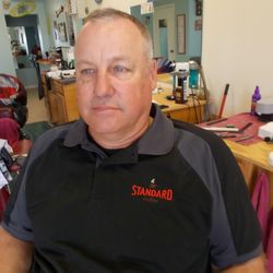 Roebuck's Barber Shop - Short on sides longer on top "No Part"