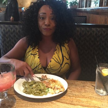 Cheddar's Scratch Kitchen - She is enjoying her food - American Near Me - Houston, Texas Cheddar's Scratch Kitchen - She is enjoying her food - American Near Me - Houston, Texas