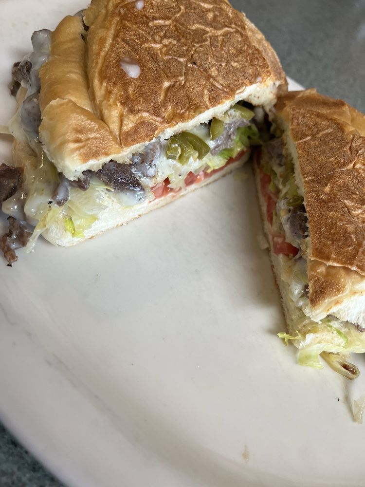 Ranchero Cafe Restaurant Logo