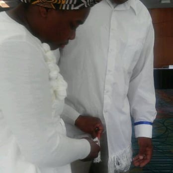 Soulful Savor - a man and a woman cutting a cake - Caterers Near Me Soulful Savor - a man and a woman cutting a cake - Caterers Near Me