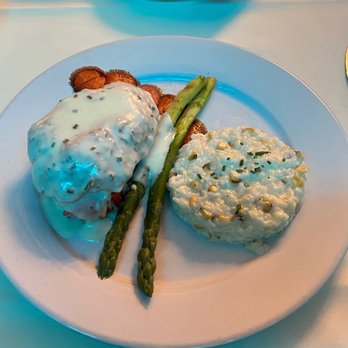Mercury Chophouse - Crab cake atop a cold water lobster tail, with asparagus and corn risotto - Steakhouses Near Me - Arlington, Texas Mercury Chophouse - Crab cake atop a cold water lobster tail, with asparagus and corn risotto - Steakhouses Near Me - Arlington, Texas