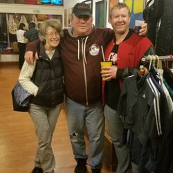 Wonderland Pop Culture Emporium - Owner Robbie Petersen (center) with friends.