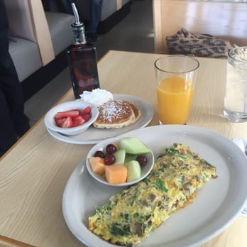 Jonny Cakes Cafe - Veggie omelette added corn, fresh fruit and pancakes on the side! - Breakfast & Brunch Near Me - Troy, Michigan