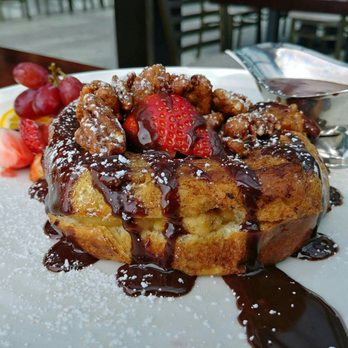 Mare Rooftop - Thick-Cut Brioche French Toast: vanilla custard, Nutella, banana stuffing, candy pecans, shaved chocolate, strawberries, Vermont maple syrup - Seafood Near Me - Providence, Rhode Island Mare Rooftop - Thick-Cut Brioche French Toast: vanilla custard, Nutella, banana stuffing, candy pecans, shaved chocolate, strawberries, Vermont maple syrup - Seafood Near Me - Providence, Rhode Island