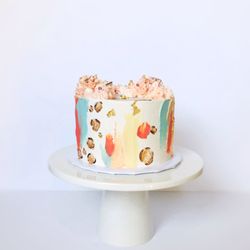 Bakes by Eileen - Strawberry Pistachio Celebration Cake (small) with abstract brush strokes, gold leopard print, and buttercream kisses.