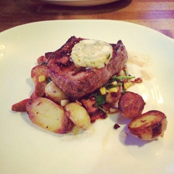 Moxies Richmond Restaurant - Top Sirloin with lobster butter, fingerling potato, chorizo sausage, spinach & corn - Steakhouses Near Me - Richmond, British Columbia