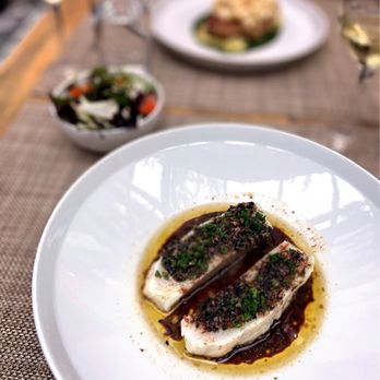 L'Abattoir - a plate of food on a table - French Near Me - Vancouver, British Columbia L'Abattoir - a plate of food on a table - French Near Me - Vancouver, British Columbia