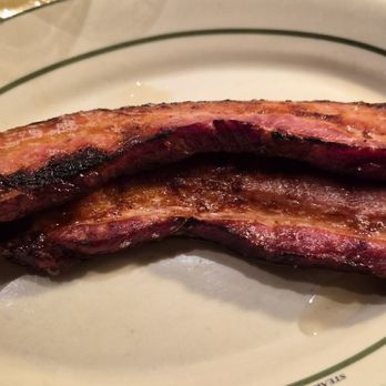 Peter Luger Steak House - sizzling bacon - Steakhouses Near Me - Las Vegas, Nevada