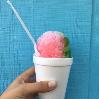 Pelican's Snoballs - a hand holding a cup of ice cream - Shaved Ice Near Me - Cleveland, Tennessee Pelican's Snoballs - a hand holding a cup of ice cream - Shaved Ice Near Me - Cleveland, Tennessee