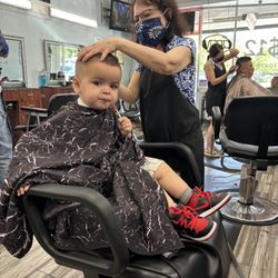 New Upper Cuts - Santana getting his hair cut.