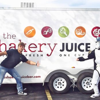 The Shakery Juice Bar - a man and a woman standing in front of a truck - Juice Bars & Smoothies Near Me The Shakery Juice Bar - a man and a woman standing in front of a truck - Juice Bars & Smoothies Near Me