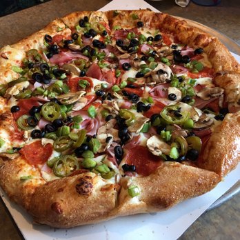 G's Pizzeria & Deli - a pizza on a tray - Pizza Near Me - Kalkaska, Michigan G's Pizzeria & Deli - a pizza on a tray - Pizza Near Me - Kalkaska, Michigan