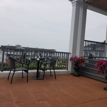 Seaview Bistro - balcony with table and chairs - American Near Me - Westbrook, Connecticut Seaview Bistro - balcony with table and chairs - American Near Me - Westbrook, Connecticut