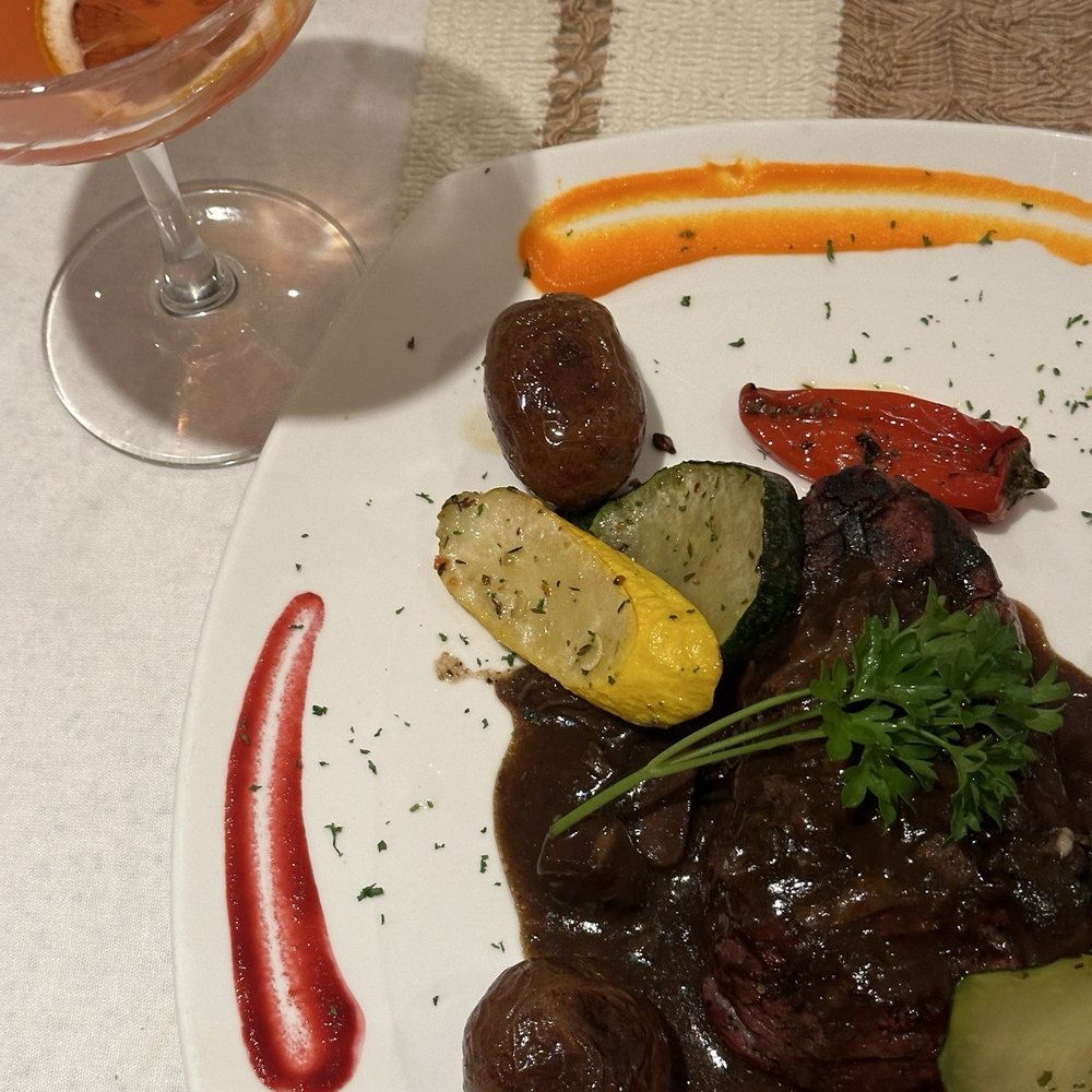 White Olive - Filet Mignon Rossini and a Aphrodite cocktail - Mediterranean Near Me - New York, New York White Olive - Filet Mignon Rossini and a Aphrodite cocktail - Mediterranean Near Me - New York, New York