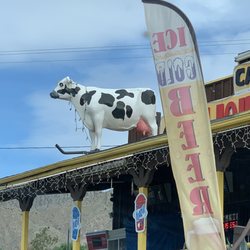 Cando Country Market - Can-Do Cow on roof!